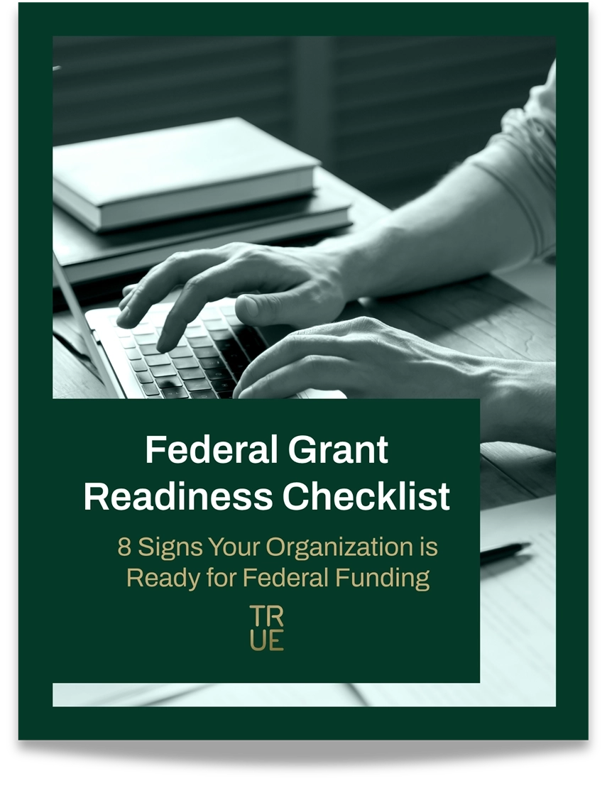 Cover of TRUE's Federal Grant Readiness Checklist showing a person typing on a laptop with books nearby.